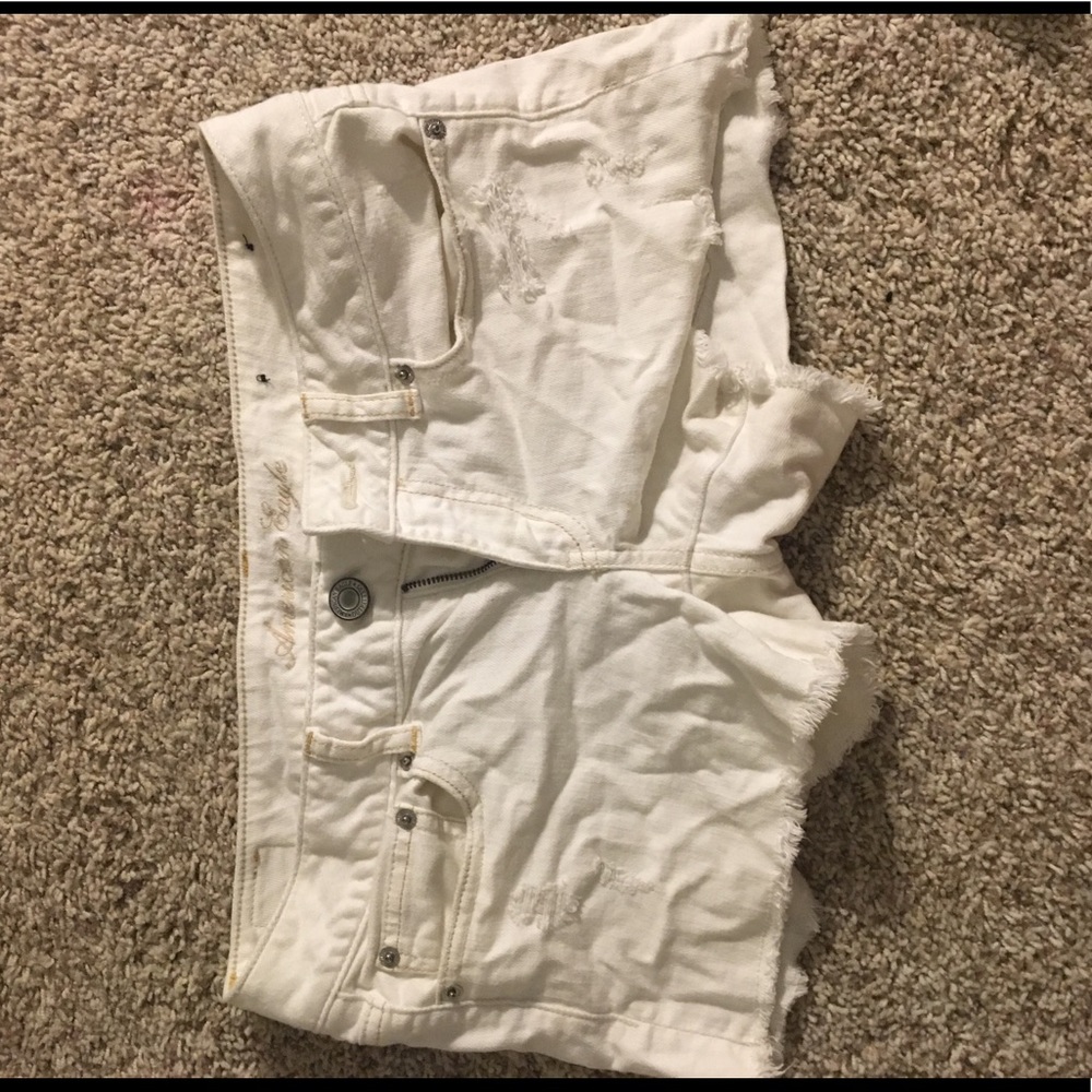 White jean shorts. American eagle. Slightly ripped